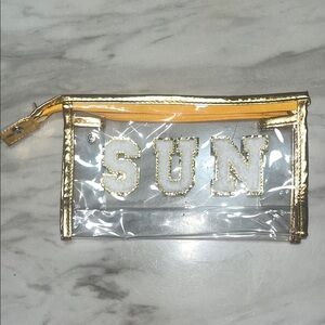 Clear Gold Trim Pouch with 'SUN' Embroidery
